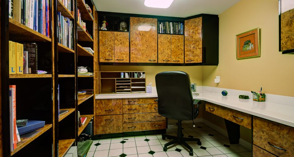 Second office with burl cabinets and bookcase