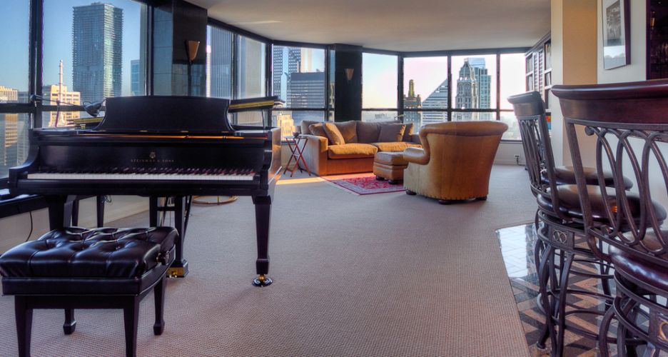 Living room easily accommodates a Grand Piano